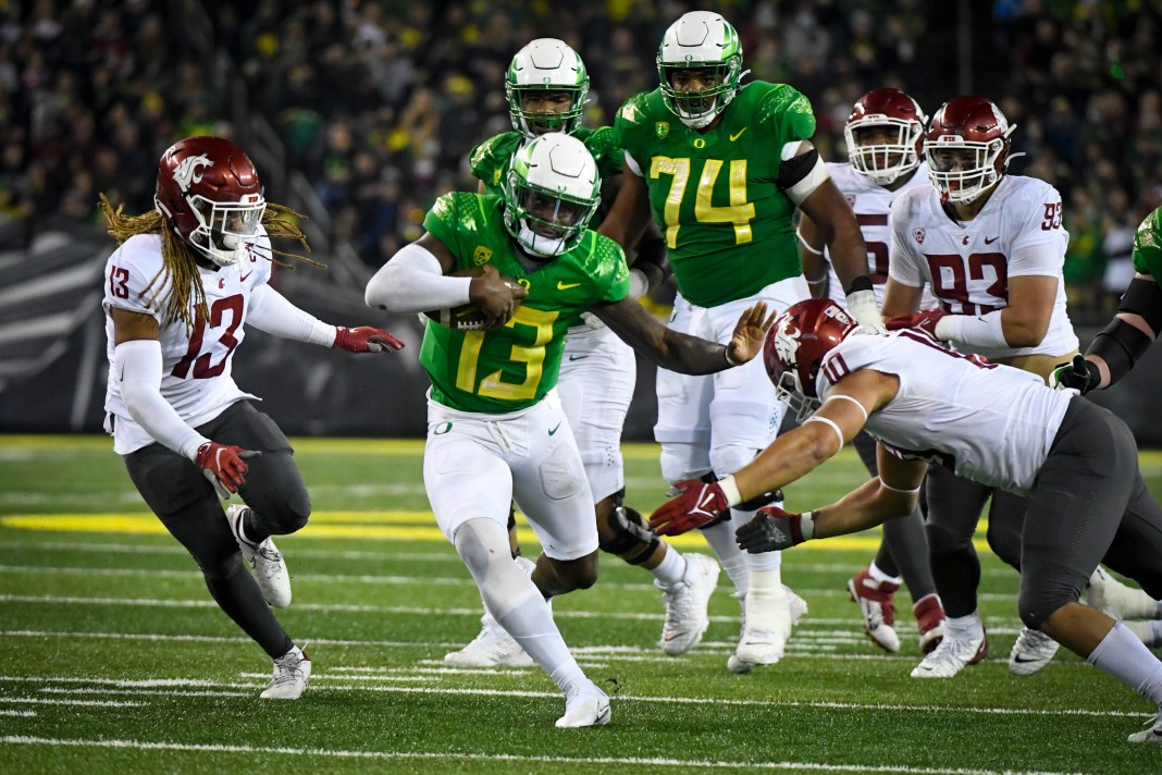 Bucky Irving Shines in Blowout Win Against Washington St.